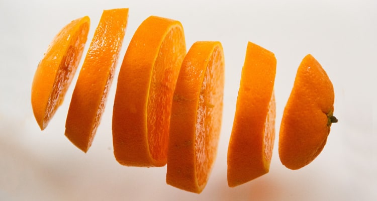 Sliced orange floating