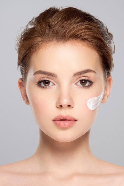 A cosmetic cream on a woman's face
