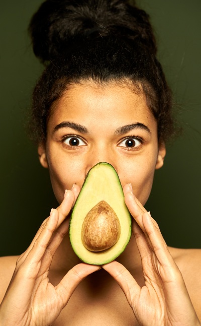 Woman loving her avocado slice