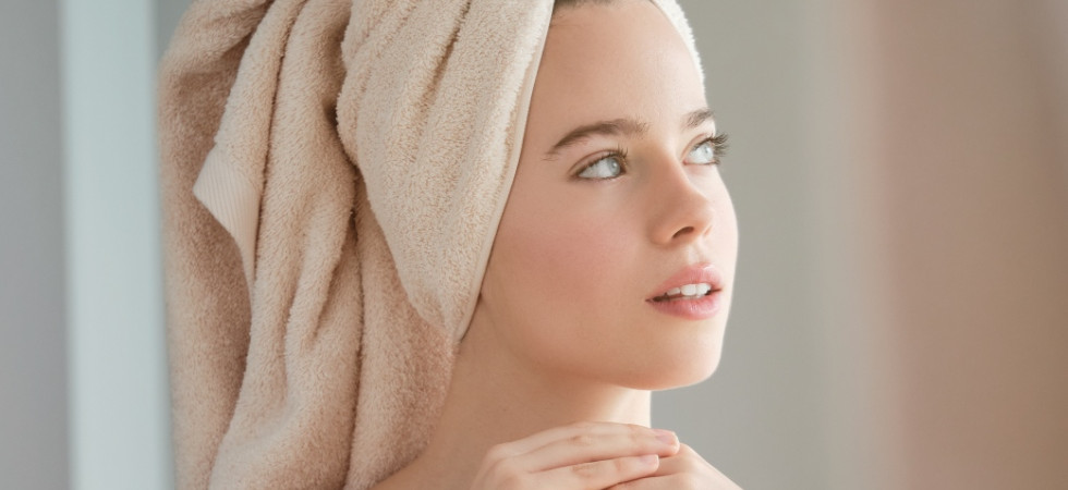 dreamy woman in towel