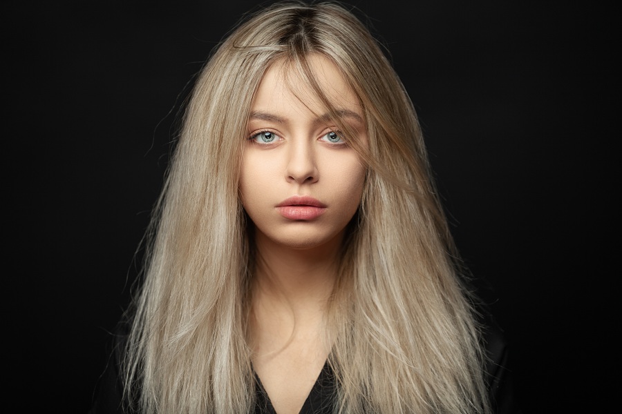 Beautiful young blonde girl with tousled hair