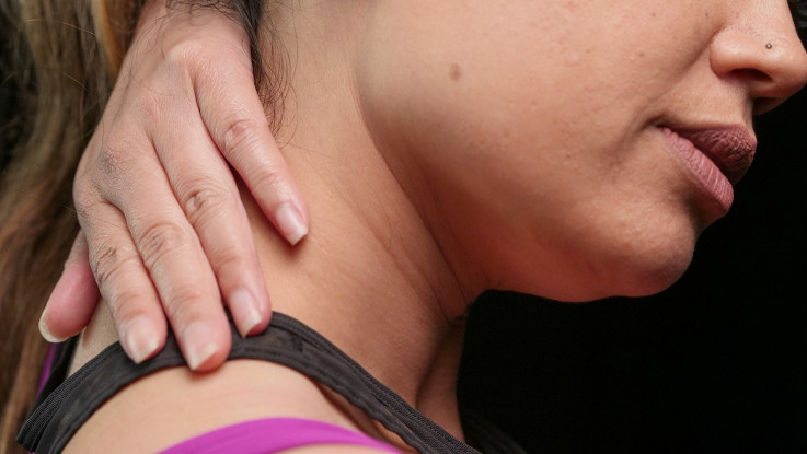 woman doing neck exercise